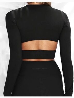 All Things Golden Sculpt Cutout Long Sleeve Top Black size medium